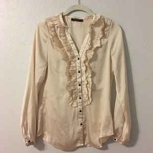 Ruffled tuxedo style blouse